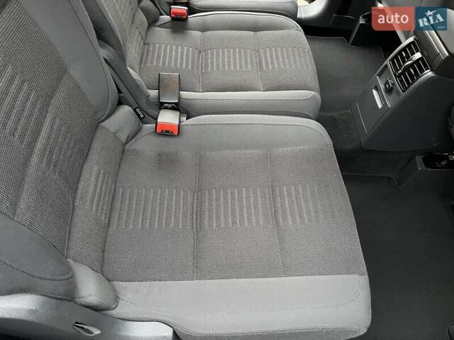 Черный Фольксваген Туран, объемом двигателя 1.4 л и пробегом 194 тыс. км за 6555 $, фото 138 на Automoto.ua