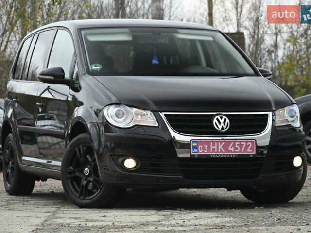 Черный Фольксваген Туран, объемом двигателя 1.6 л и пробегом 152 тыс. км за 7600 $, фото 1 на Automoto.ua