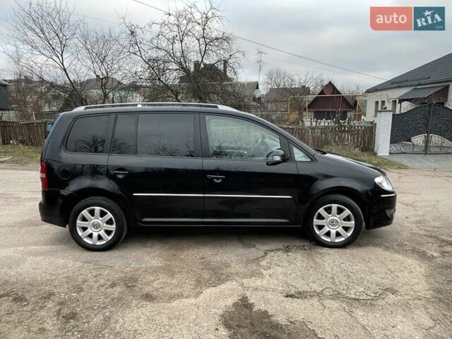 Черный Фольксваген Туран, объемом двигателя 1.4 л и пробегом 194 тыс. км за 6555 $, фото 7 на Automoto.ua