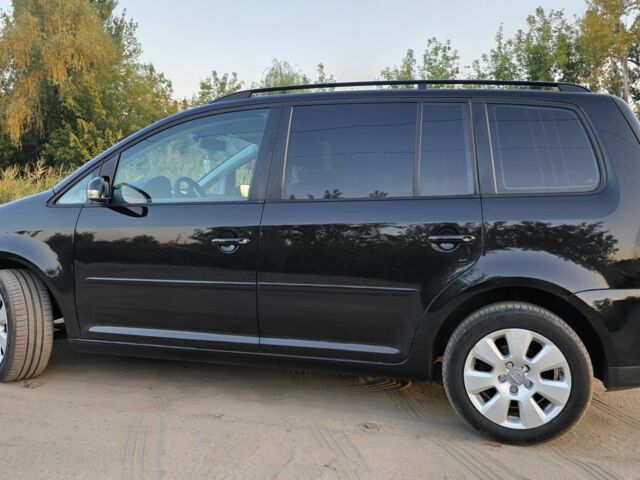 Черный Фольксваген Туран, объемом двигателя 1.4 л и пробегом 200 тыс. км за 6900 $, фото 3 на Automoto.ua