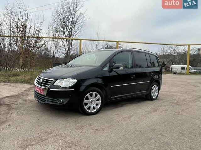 Черный Фольксваген Туран, объемом двигателя 1.4 л и пробегом 194 тыс. км за 6555 $, фото 9 на Automoto.ua
