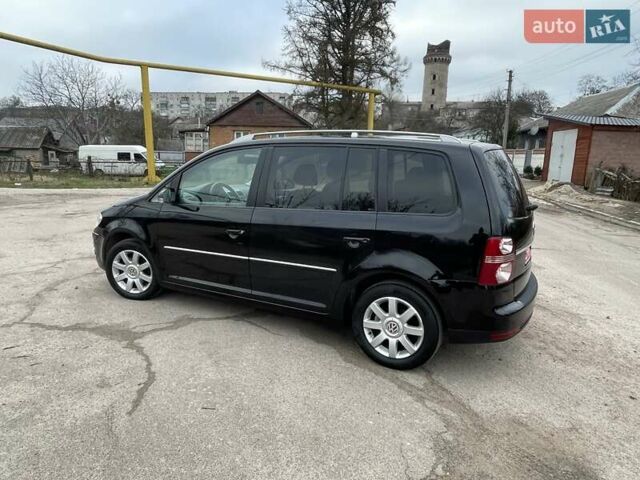 Черный Фольксваген Туран, объемом двигателя 1.4 л и пробегом 194 тыс. км за 6555 $, фото 33 на Automoto.ua