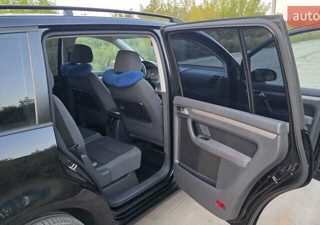 Черный Фольксваген Туран, объемом двигателя 1.4 л и пробегом 194 тыс. км за 7600 $, фото 23 на Automoto.ua