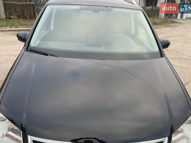 Черный Фольксваген Туран, объемом двигателя 1.4 л и пробегом 194 тыс. км за 6555 $, фото 15 на Automoto.ua