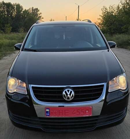 Черный Фольксваген Туран, объемом двигателя 1.4 л и пробегом 194 тыс. км за 7600 $, фото 5 на Automoto.ua