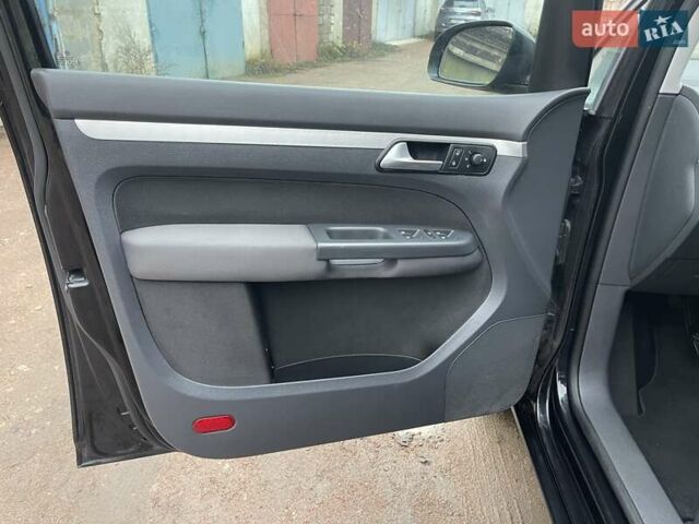 Черный Фольксваген Туран, объемом двигателя 1.4 л и пробегом 194 тыс. км за 6555 $, фото 36 на Automoto.ua