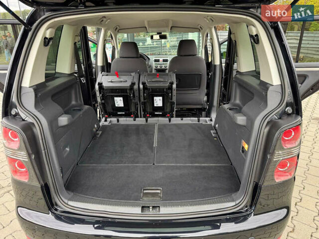 Черный Фольксваген Туран, объемом двигателя 1.4 л и пробегом 190 тыс. км за 7200 $, фото 49 на Automoto.ua