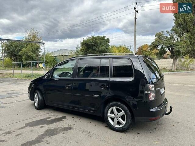 Чорний Фольксваген Туран, об'ємом двигуна 1.4 л та пробігом 237 тис. км за 6850 $, фото 1 на Automoto.ua