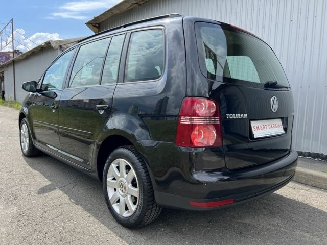 Черный Фольксваген Туран, объемом двигателя 1.4 л и пробегом 203 тыс. км за 6550 $, фото 6 на Automoto.ua