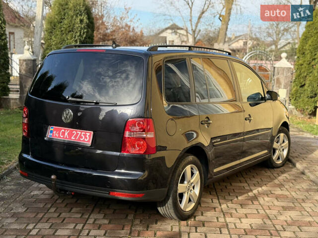 Чорний Фольксваген Туран, об'ємом двигуна 1.4 л та пробігом 148 тис. км за 5999 $, фото 25 на Automoto.ua