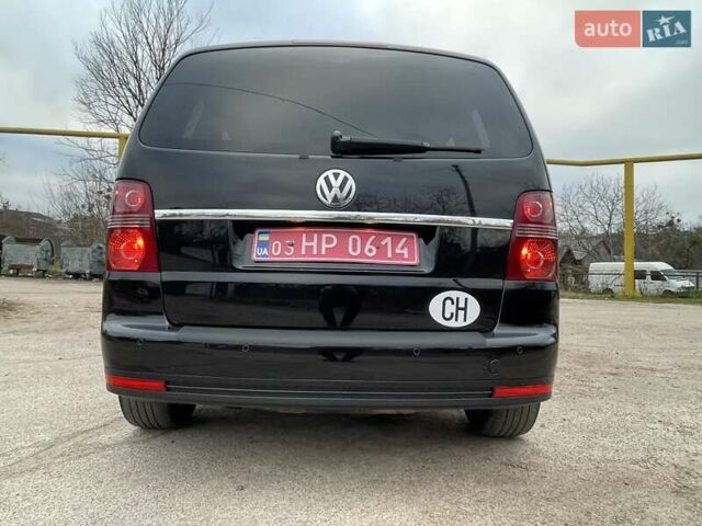 Черный Фольксваген Туран, объемом двигателя 1.4 л и пробегом 194 тыс. км за 6555 $, фото 28 на Automoto.ua