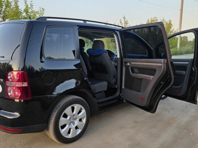 Черный Фольксваген Туран, объемом двигателя 1.4 л и пробегом 200 тыс. км за 6900 $, фото 10 на Automoto.ua