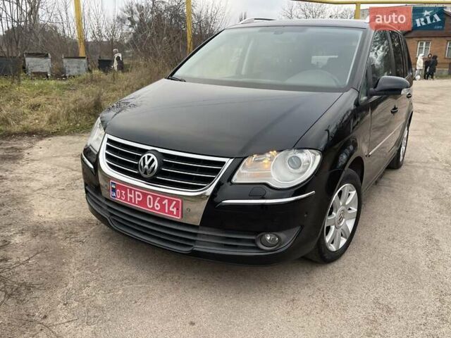Черный Фольксваген Туран, объемом двигателя 1.4 л и пробегом 194 тыс. км за 6555 $, фото 10 на Automoto.ua