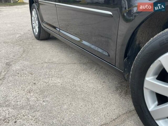 Черный Фольксваген Туран, объемом двигателя 1.4 л и пробегом 194 тыс. км за 6555 $, фото 177 на Automoto.ua