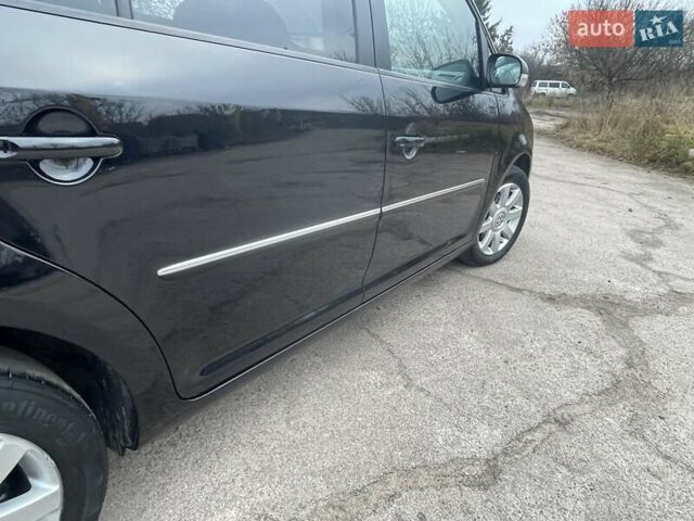 Черный Фольксваген Туран, объемом двигателя 1.4 л и пробегом 194 тыс. км за 6555 $, фото 182 на Automoto.ua