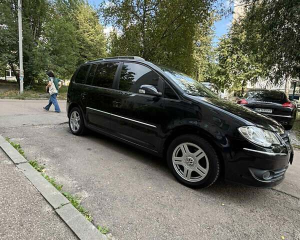 Черный Фольксваген Туран, объемом двигателя 1.39 л и пробегом 167 тыс. км за 7900 $, фото 25 на Automoto.ua