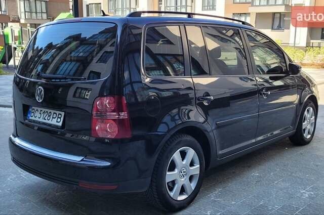 Черный Фольксваген Туран, объемом двигателя 1.97 л и пробегом 248 тыс. км за 8300 $, фото 5 на Automoto.ua