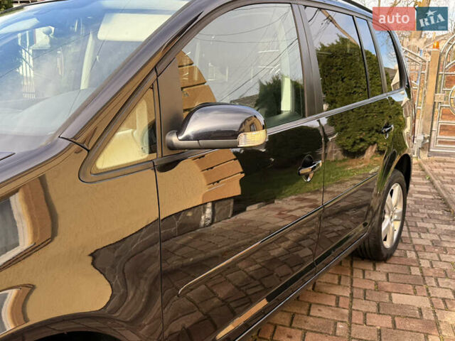 Чорний Фольксваген Туран, об'ємом двигуна 1.4 л та пробігом 148 тис. км за 5999 $, фото 68 на Automoto.ua