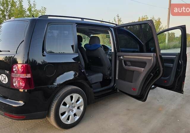 Черный Фольксваген Туран, объемом двигателя 1.4 л и пробегом 194 тыс. км за 7600 $, фото 11 на Automoto.ua