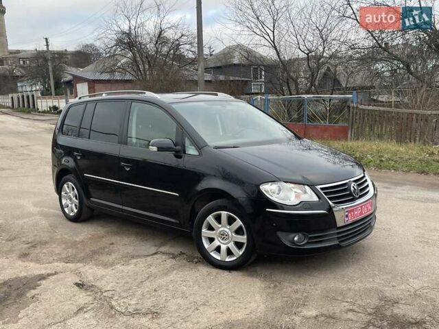 Черный Фольксваген Туран, объемом двигателя 1.4 л и пробегом 194 тыс. км за 6555 $, фото 3 на Automoto.ua