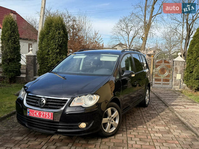 Чорний Фольксваген Туран, об'ємом двигуна 1.4 л та пробігом 148 тис. км за 5999 $, фото 4 на Automoto.ua