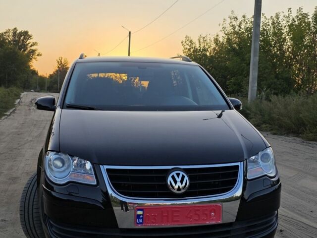 Черный Фольксваген Туран, объемом двигателя 1.4 л и пробегом 200 тыс. км за 6900 $, фото 6 на Automoto.ua