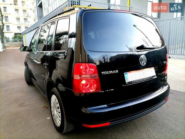 Черный Фольксваген Туран, объемом двигателя 1.4 л и пробегом 193 тыс. км за 6600 $, фото 17 на Automoto.ua