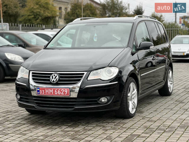 Черный Фольксваген Туран, объемом двигателя 1.4 л и пробегом 195 тыс. км за 7600 $, фото 2 на Automoto.ua
