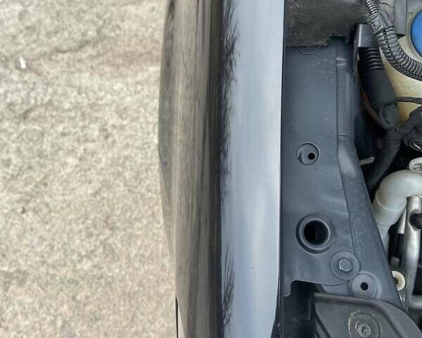 Черный Фольксваген Туран, объемом двигателя 1.4 л и пробегом 194 тыс. км за 6555 $, фото 167 на Automoto.ua