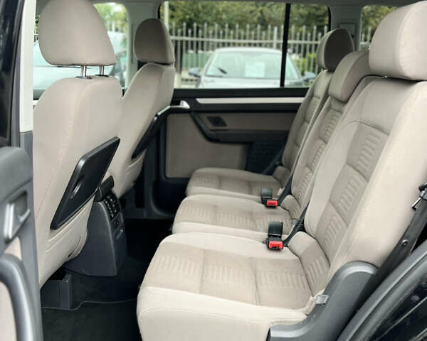 Черный Фольксваген Туран, объемом двигателя 1.4 л и пробегом 195 тыс. км за 7600 $, фото 11 на Automoto.ua