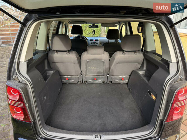 Чорний Фольксваген Туран, об'ємом двигуна 1.4 л та пробігом 148 тис. км за 5999 $, фото 46 на Automoto.ua