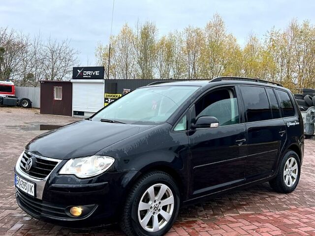 Черный Фольксваген Туран, объемом двигателя 1.9 л и пробегом 354 тыс. км за 6950 $, фото 12 на Automoto.ua