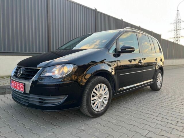 Черный Фольксваген Туран, объемом двигателя 1.6 л и пробегом 240 тыс. км за 8100 $, фото 4 на Automoto.ua