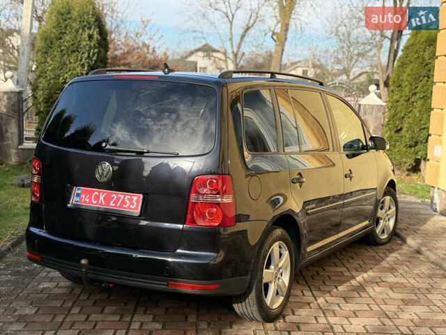 Чорний Фольксваген Туран, об'ємом двигуна 1.4 л та пробігом 148 тис. км за 5999 $, фото 28 на Automoto.ua