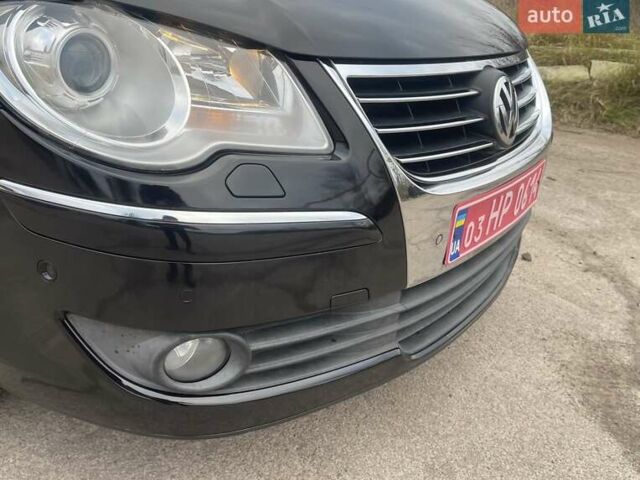 Черный Фольксваген Туран, объемом двигателя 1.4 л и пробегом 194 тыс. км за 6555 $, фото 14 на Automoto.ua