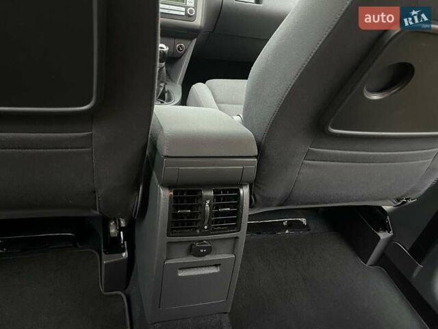 Черный Фольксваген Туран, объемом двигателя 1.4 л и пробегом 194 тыс. км за 6555 $, фото 126 на Automoto.ua