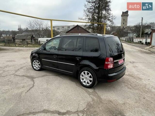 Черный Фольксваген Туран, объемом двигателя 1.4 л и пробегом 194 тыс. км за 6555 $, фото 72 на Automoto.ua