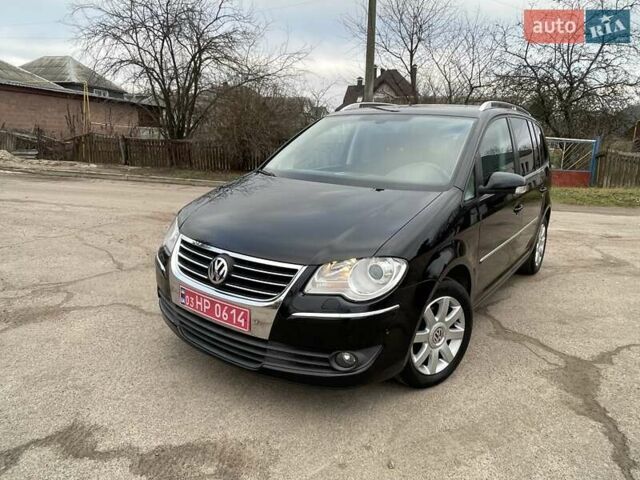 Черный Фольксваген Туран, объемом двигателя 1.4 л и пробегом 194 тыс. км за 6555 $, фото 17 на Automoto.ua