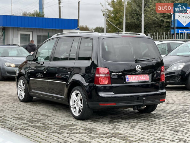 Черный Фольксваген Туран, объемом двигателя 1.4 л и пробегом 195 тыс. км за 7600 $, фото 4 на Automoto.ua