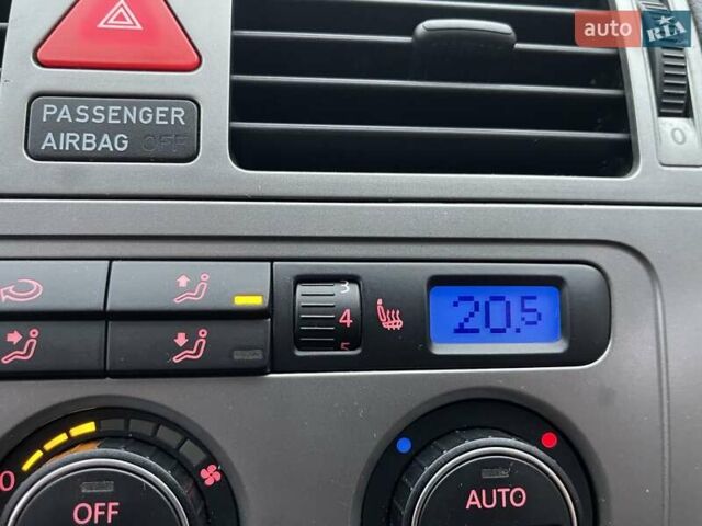 Черный Фольксваген Туран, объемом двигателя 1.4 л и пробегом 194 тыс. км за 6555 $, фото 105 на Automoto.ua