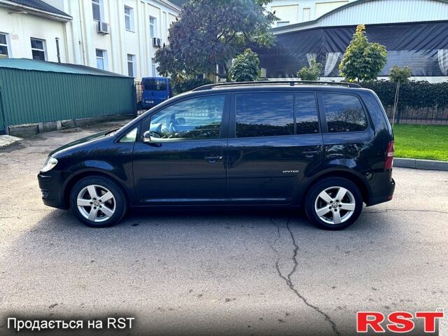 Черный Фольксваген Туран, объемом двигателя 1.6 л и пробегом 224 тыс. км за 8550 $, фото 2 на Automoto.ua