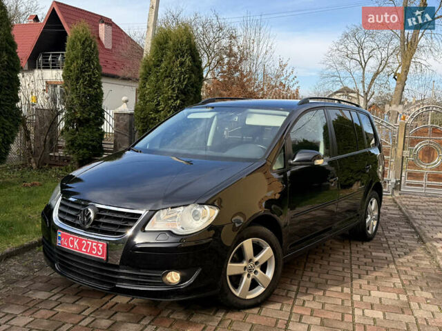 Чорний Фольксваген Туран, об'ємом двигуна 1.4 л та пробігом 148 тис. км за 5999 $, фото 2 на Automoto.ua