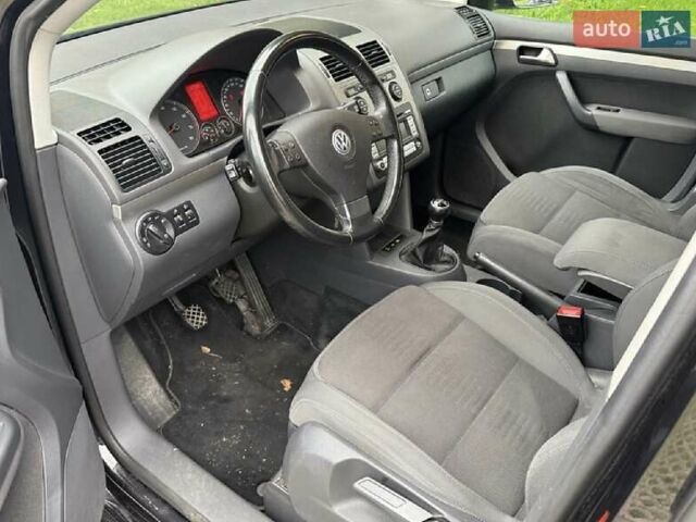 Черный Фольксваген Туран, объемом двигателя 1.4 л и пробегом 194 тыс. км за 6555 $, фото 227 на Automoto.ua