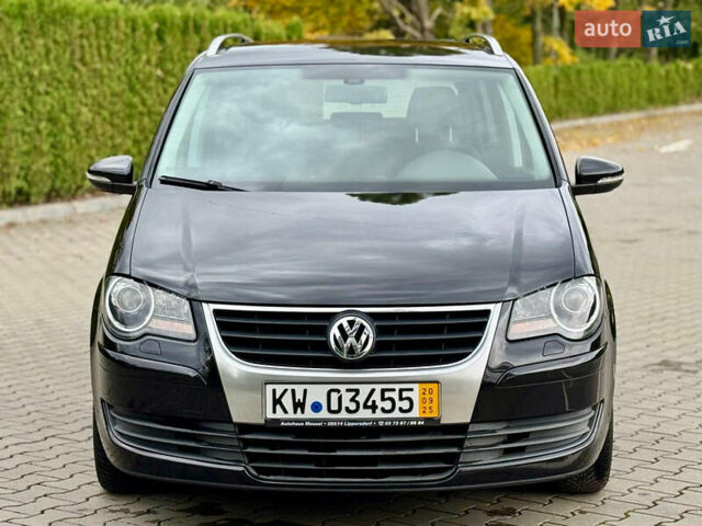 Черный Фольксваген Туран, объемом двигателя 1.4 л и пробегом 190 тыс. км за 7200 $, фото 4 на Automoto.ua