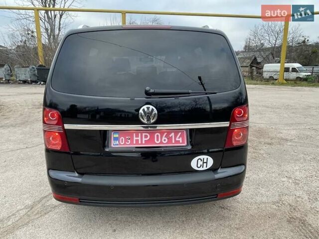 Черный Фольксваген Туран, объемом двигателя 1.4 л и пробегом 194 тыс. км за 6555 $, фото 25 на Automoto.ua