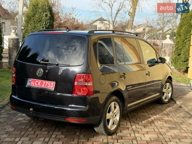 Чорний Фольксваген Туран, об'ємом двигуна 1.4 л та пробігом 148 тис. км за 5999 $, фото 26 на Automoto.ua