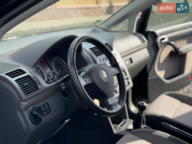 Чорний Фольксваген Туран, об'ємом двигуна 1.4 л та пробігом 220 тис. км за 8350 $, фото 25 на Automoto.ua