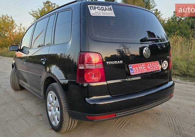 Черный Фольксваген Туран, объемом двигателя 1.4 л и пробегом 194 тыс. км за 7600 $, фото 9 на Automoto.ua