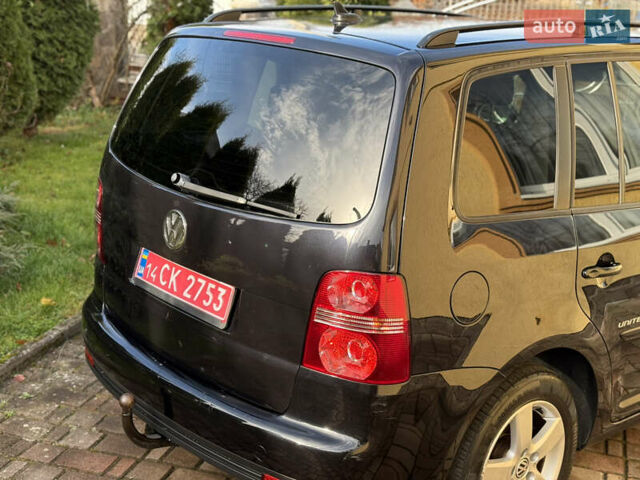 Чорний Фольксваген Туран, об'ємом двигуна 1.4 л та пробігом 148 тис. км за 5999 $, фото 67 на Automoto.ua