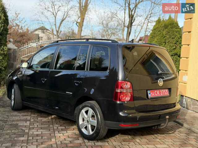 Чорний Фольксваген Туран, об'ємом двигуна 1.4 л та пробігом 148 тис. км за 5999 $, фото 22 на Automoto.ua